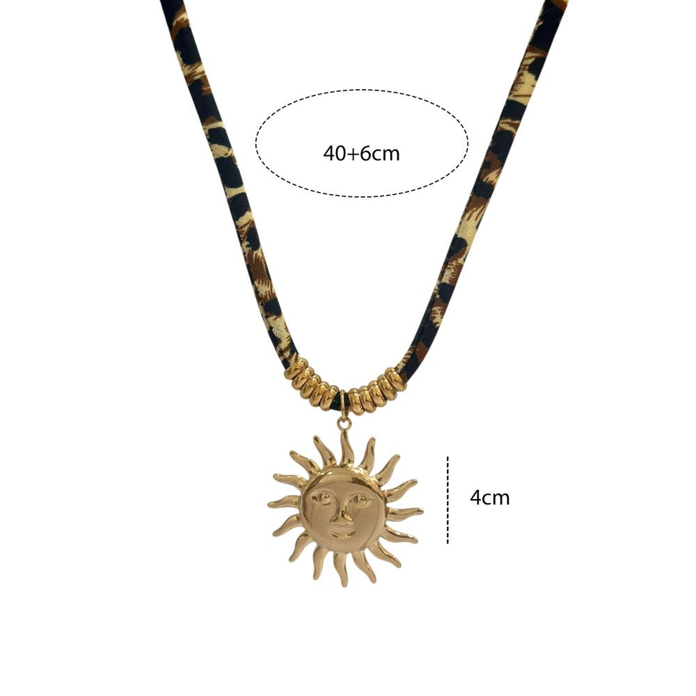 Ατσάλινο κολιέ με ήλιο σε leopard κορδόνι Stainless steel necklace with sun pendant on leopard cord